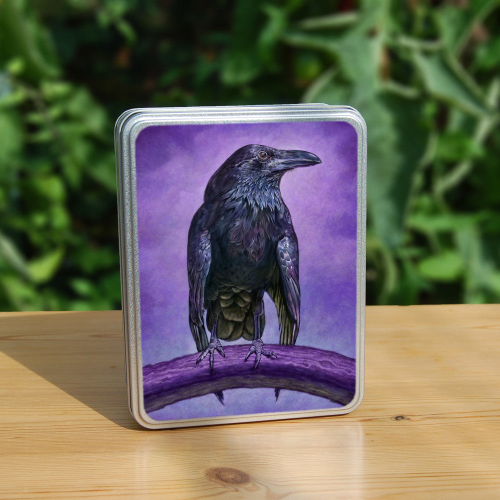 A raven sitting on a branch facing the viewer with their head turned sideways and wings slightly open. The raven is coloured black with purple shading, and the background is mottled purple.