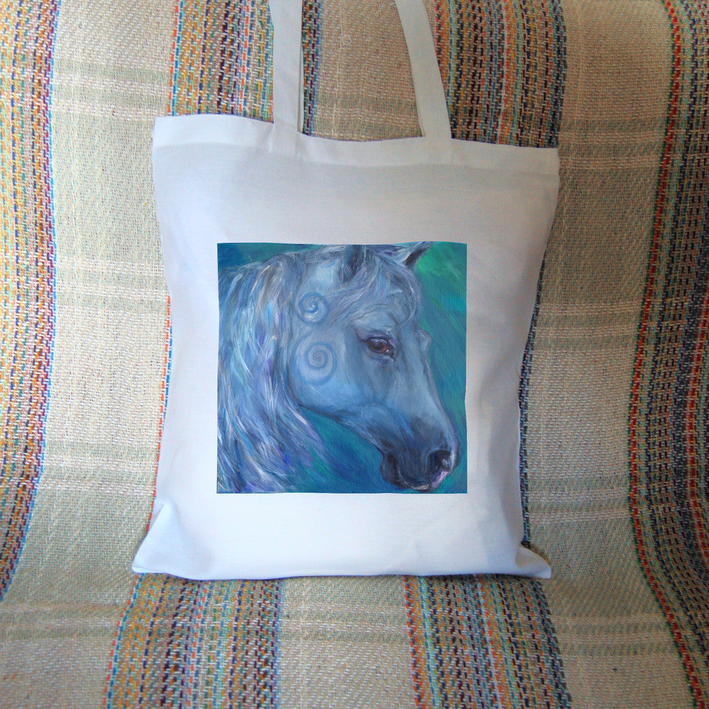 The head and mane of a horse, head facing mostly to the right. The horse is painted entirely in blue apart from a deep brown eye, with two spirals on and above the cheek. The background is blue-green.