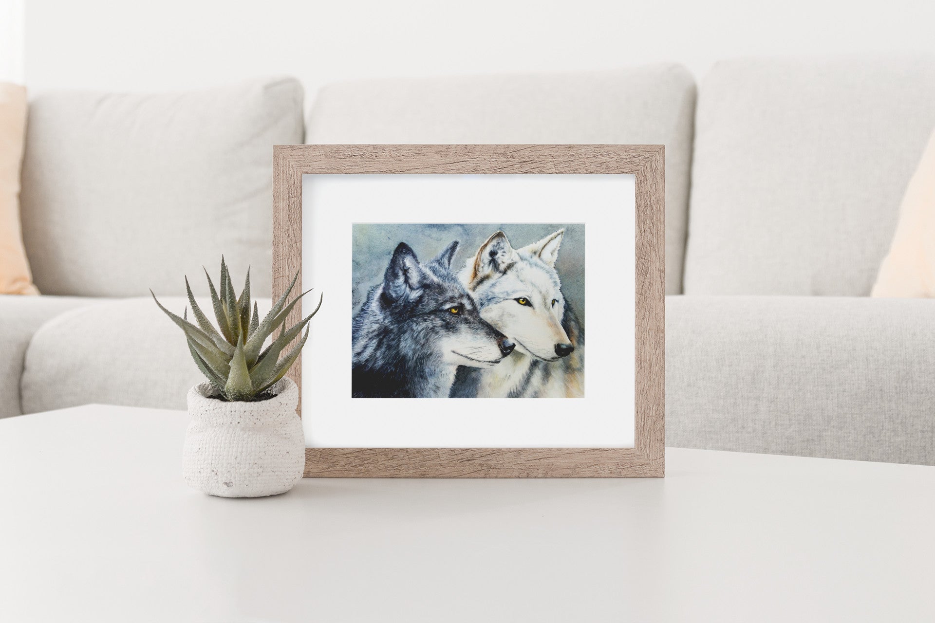 Mockup of art in frame on table.