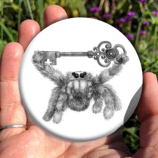 Black and white pencil drawing of a fluffy grey spider holding an ornate key above their head with their two front legs. The appearance and posture is furry and friendly, and not intended to be scary.