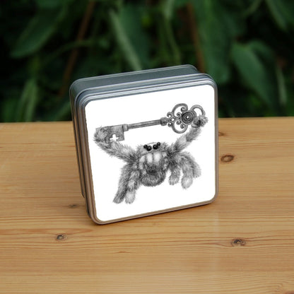 Black and white pencil drawing of a fluffy grey spider holding an ornate key above their head with their two front legs. The appearance and posture is furry and friendly, and not intended to be scary.