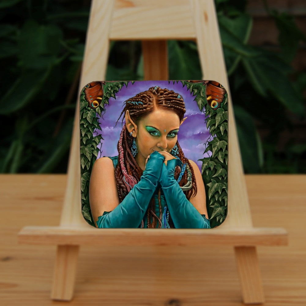 A brown-skinned female elf with long braided brown hair tied back, looks toward the viewer, hands held together in front of her mouth as though to suppress laughter. She wears a turquoise sleeveless dress and elbow-length arm sleeves. She's surrounded by ivy with a butterfly in each corner.