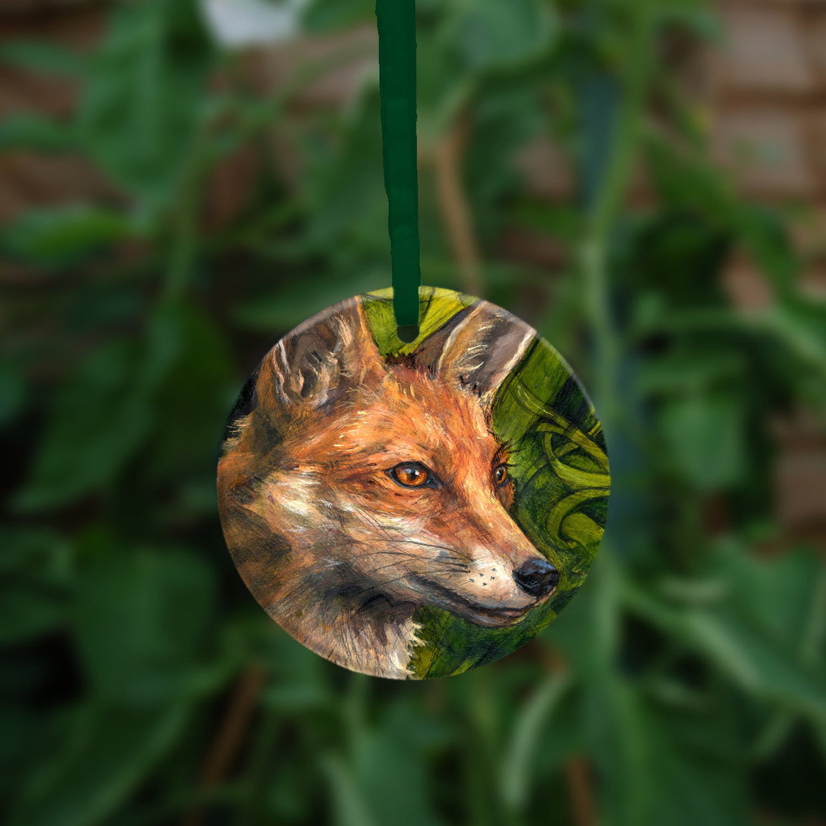 The second side of the ornament showing a close-up of the fox's head.