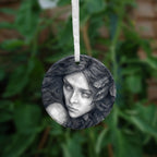 The other side of the ornament, showing a close-up of the woman's face.