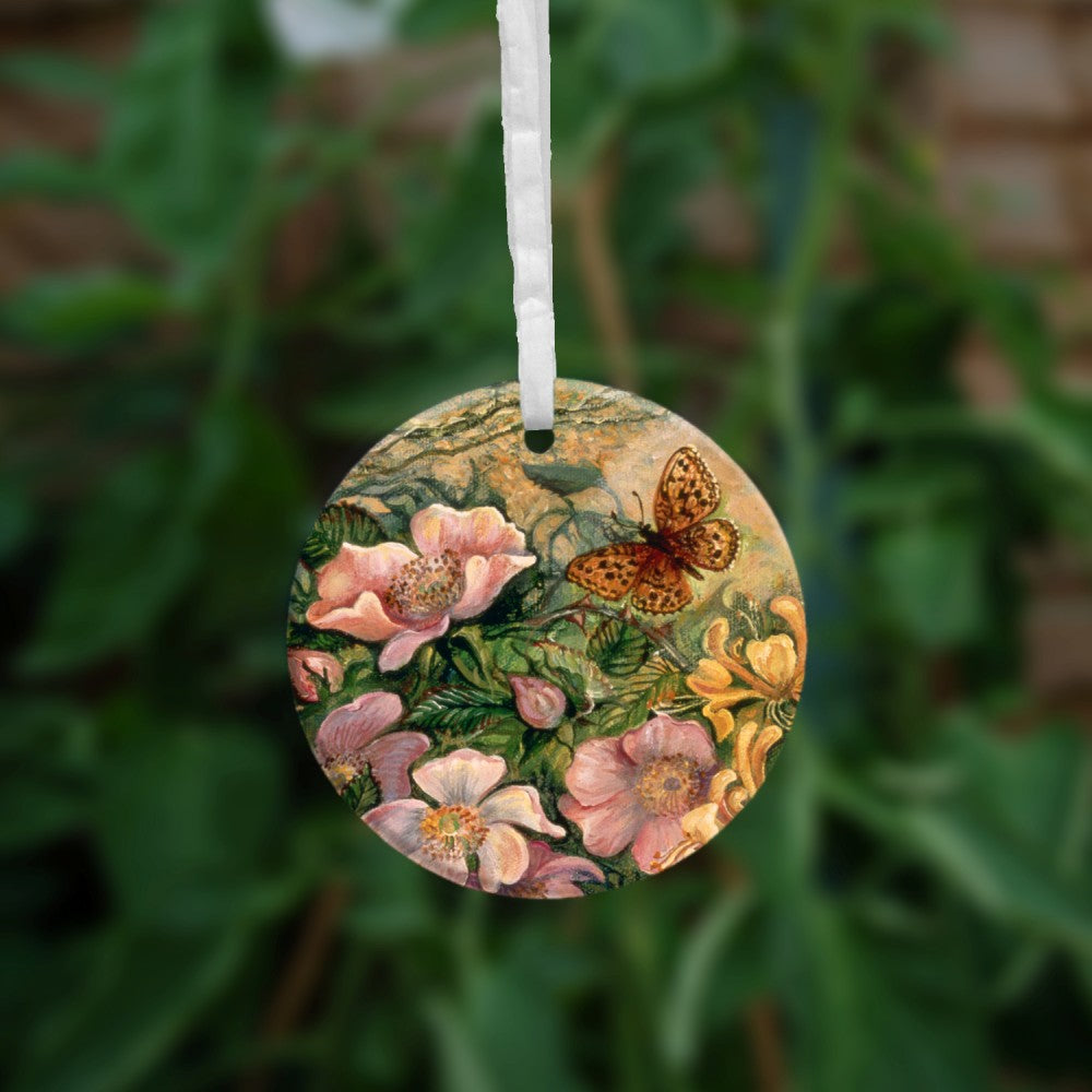 The reverse side of the ornament. Honeysuckle, dog rose and a butterfly.