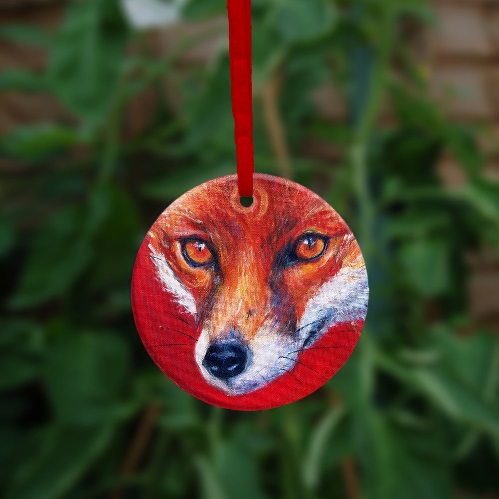 The reverse side of the ornament, showing a close-up of the fox's face.