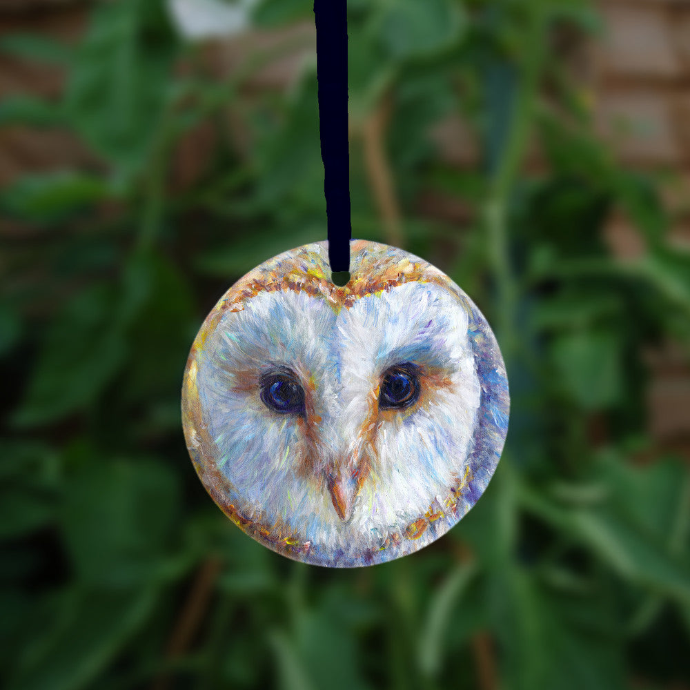 The reverse side of the ornament, showing a slightly closer view of the owl's head.
