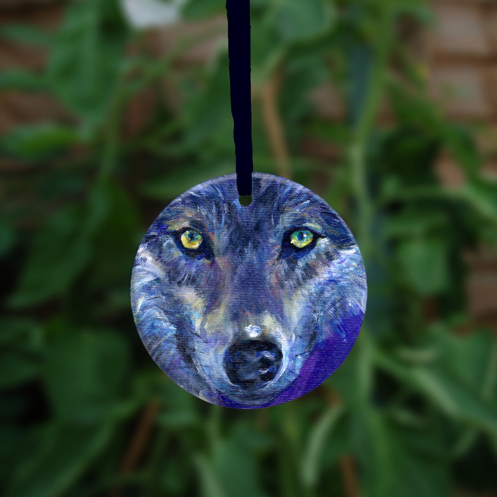 The reverse side of the ornament, showing a close-up of the wolf's face.