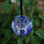 The reverse side of the ornament, showing a close-up of the wolf's face.