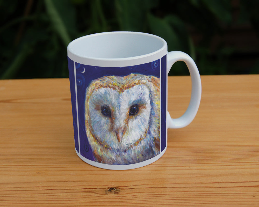 The head of a barn owl, looking directly at the viewer. The background is deep blue.