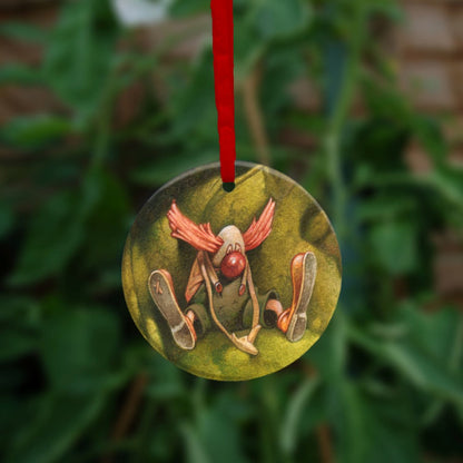 The reverse side of the ornament. A tiny clown sits looking forlorn at the bottom of a tree stump.