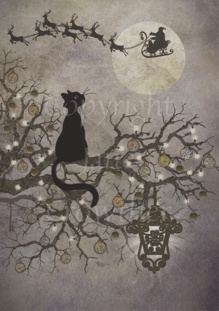 The silhouette of a black cat sitting on a branch of a tree looks up towards santa on his sleigh, and his team of reindeer, crossing the sky in front of a full moon. The branches are decorated with baubles, and a decorative lantern hangs, shining, from one of them.