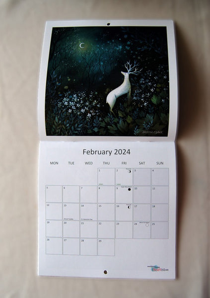 Page for February 2024, showing a white stag standing in woodland, looking towards a crescent moon. The calendar opens up to show the image at the top, with the calendar section below.