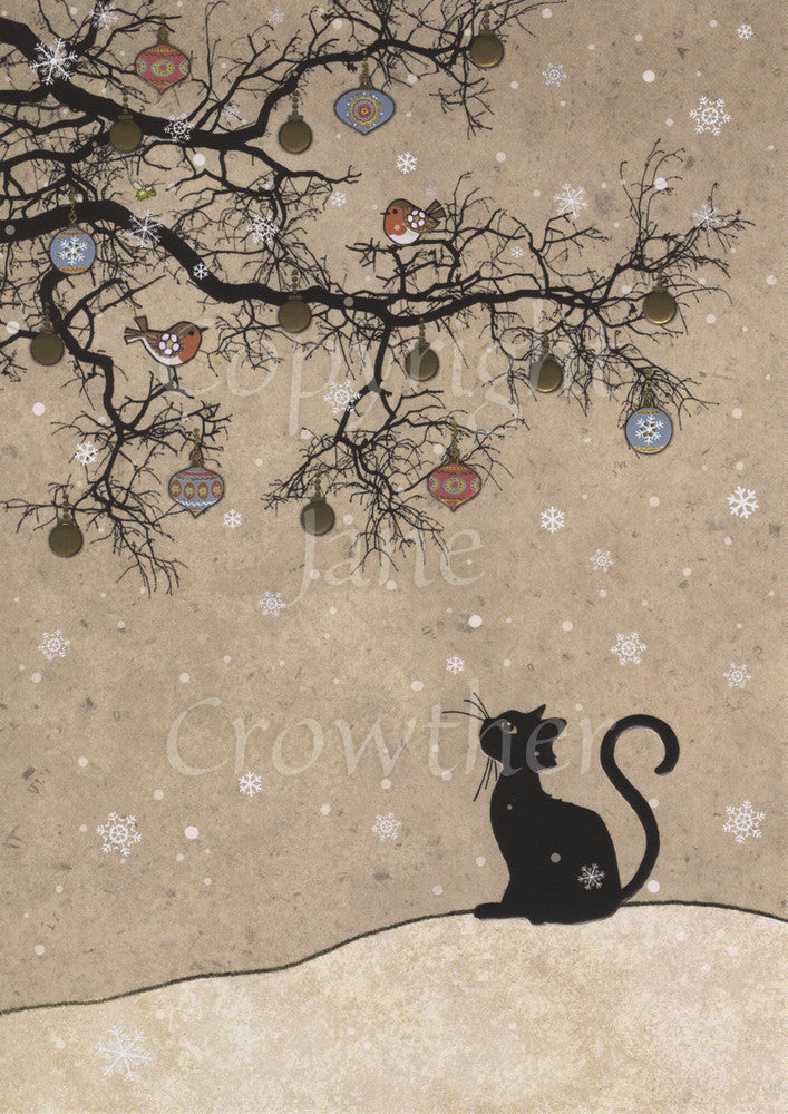 The silhouette of a black cat sitting looking up towards the silhouette of a leafless tree. The tree is decorated with colourful baubles. Two robins sit in the tree, and snow falls all around. The background is shades of beige.