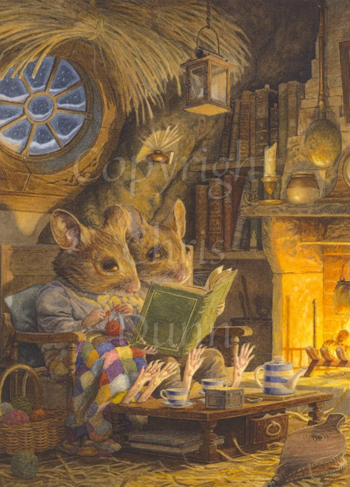 Two mice sit together on a seat next to a roaring fire which adds a warm glow to the scene. A tea pot and cups are on a low table in front of them. One is reading a book, with the other knitting, a blanket on their knees, peering across at the book. Above and behind them, a circular window looks out to the night sky. There's snow on the window frame. Shelves next to the fire contain lots of books. There's straw on the floor and hanging above them.