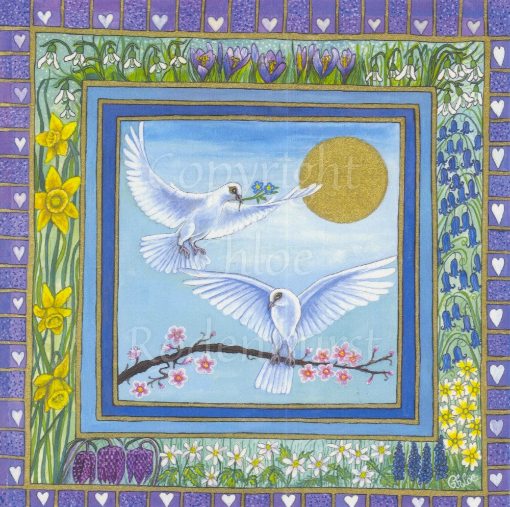 A white dove carries blue flowers to another dove perched on a pink-blossomed branch. The sun shines overhead against a blue sky. The design is enclosed in a box which is surrounded by spring flowers including crocuses, bluebells and daffodils. These are in turn enclosed within a purple border with white hearts.