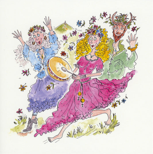 Three colourful people walk from right to left. At the front, a woman with long blond hair and wearing a long pink dress, is barefoot and beats a hand-held drum. To her left, a grey-haired woman wearing a blue top and skirt, and floral headdress, raises her hands skywards. A bearded man dressed in green and wearing decorated antlers on his head walks behind them. Flowers are scattered in the air around them, and Glastonbury Tor can be seen in the distance.