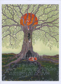 A tree, its branches just coming into leaf, sits surrounded by grass and small flowers in yellow and white. A red fox sleeps curled up at the base of the tree, and high up in the spreading branches, another fox sits, watching a deep red sun rise from behind the tree. Ivy climbs the tree, and there's a large hollow halfway up the trunk with two owls peering out from within it. The inscription at the bottom reads, I'll tell you how the sun rose a ribbon at a time.