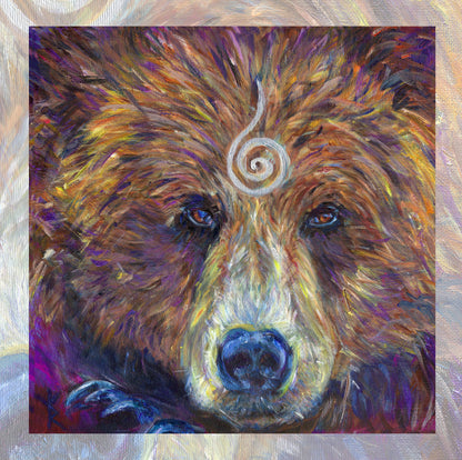 The head of a bear looking directly at the viewer. A pale-coloured spiral is coiled at their forehead, opening upwards. Their fur is a mixture of reds, golds and browns, with a pale snout.