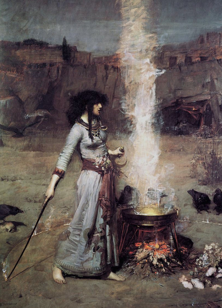 A woman walks barefoot around a metal firepit with a fire burning brightly underneath. She holds a sickle-shaped tool in the hand nearest the fire, and a long black pole, pointing outwards and touching the ground, in the other. The stick is creating a low burning circle of fire as she walks around the fire. The woman has long black hair and is wearing a long blue-grey dress. Ravens sit on the outside of the circle, and caves and rocks can be seen in the background. 