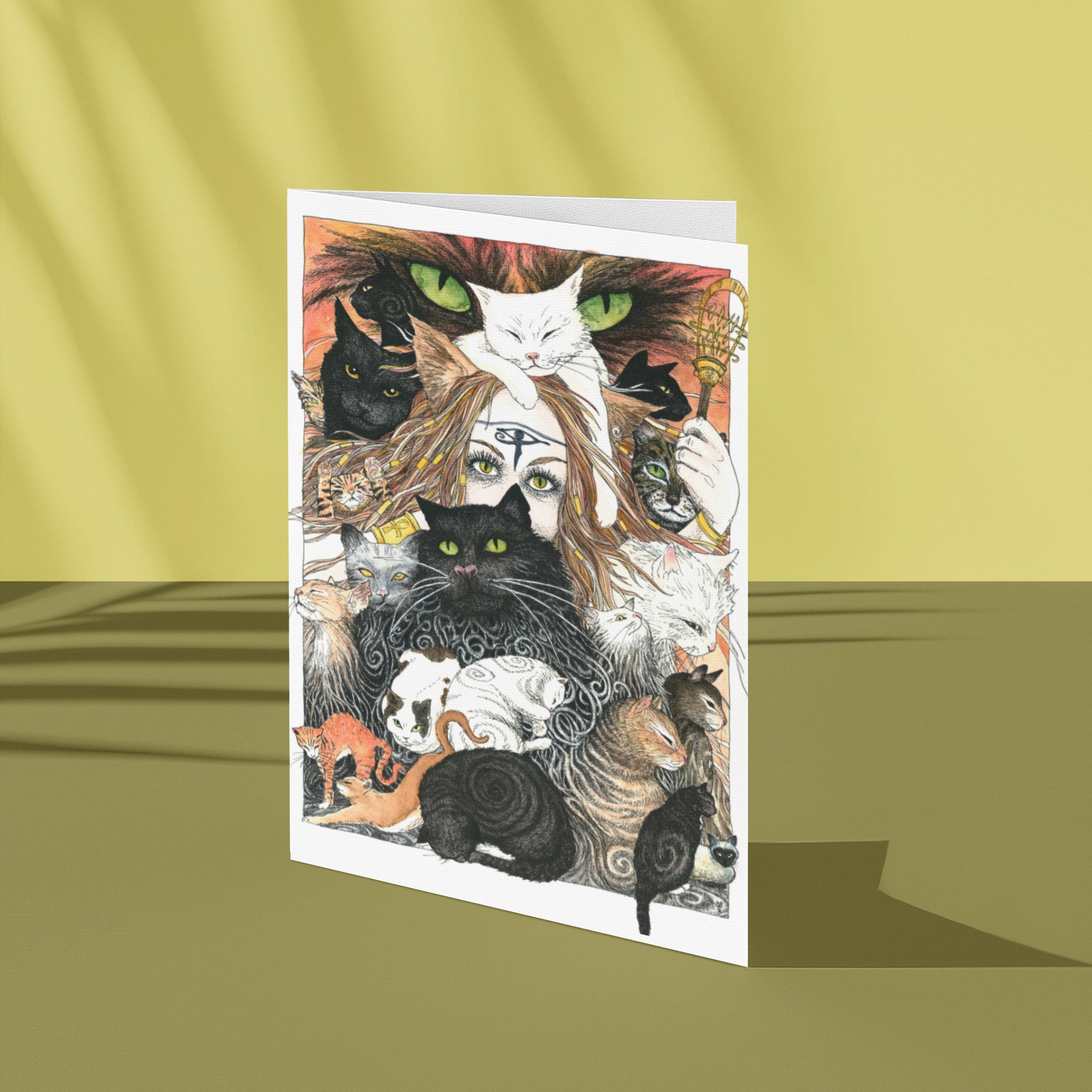 Greeting card with illustrations of cats on a yellow background
