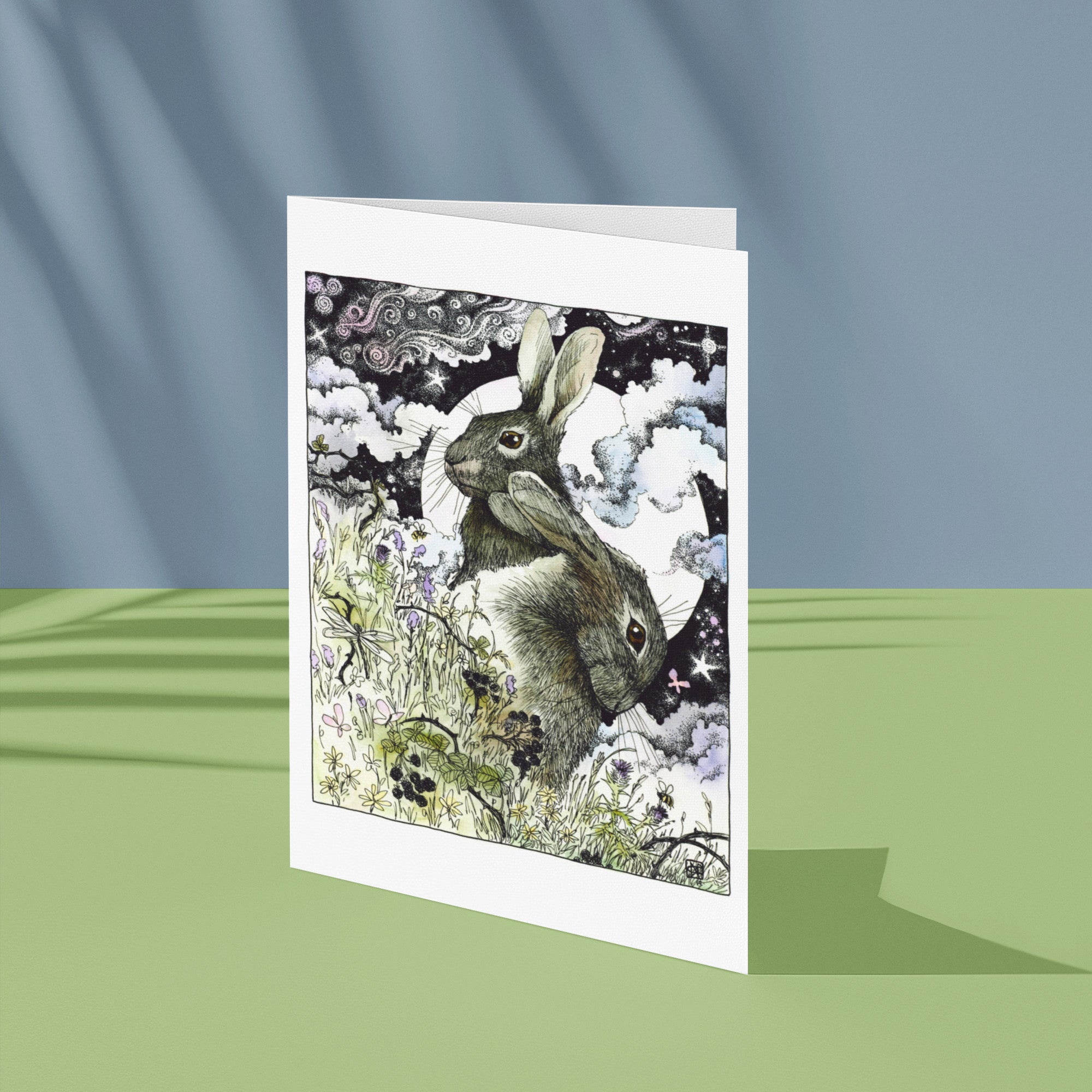 Greeting card with hares illustration on a gradient background