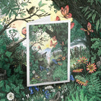 Greeting card of a forest scene with birds and flowers, surrounded by a matching background.
