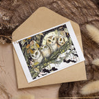 Greeting card with owl design on a brown envelope against a textured background