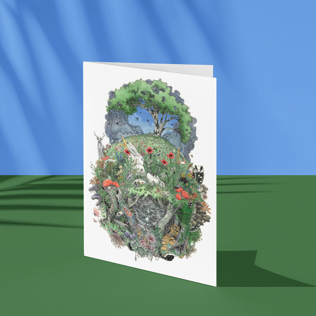 Greeting card with nature-themed design on a blue and green gradient background