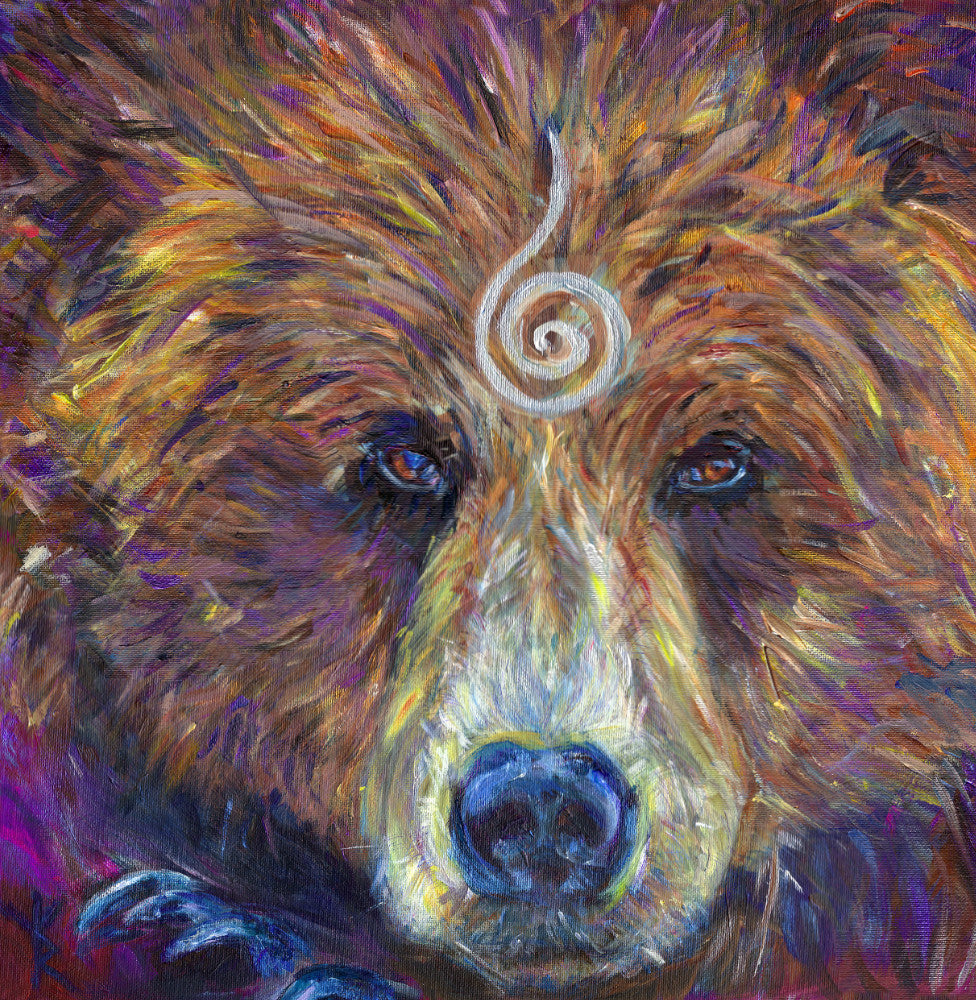 The head of a bear looking directly at the viewer. A pale-coloured spiral is coiled at their forehead, opening upwards. Their fur is a mixture of reds, golds and browns, with a pale nose.