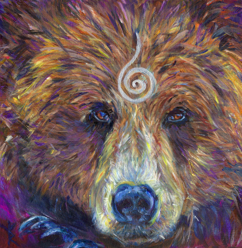 The head of a bear looking directly at the viewer. A pale-coloured spiral is coiled at their forehead, opening upwards. Their fur is a mixture of reds, golds and browns, with a pale nose.