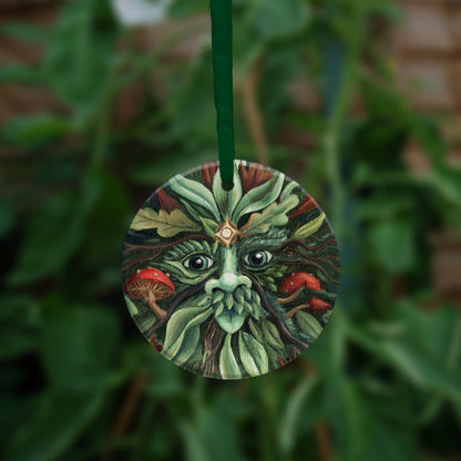 The other side of the ornament, showing a close up of the green man's face.