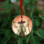 The other side of the ornament, showing a close up of the fairy.