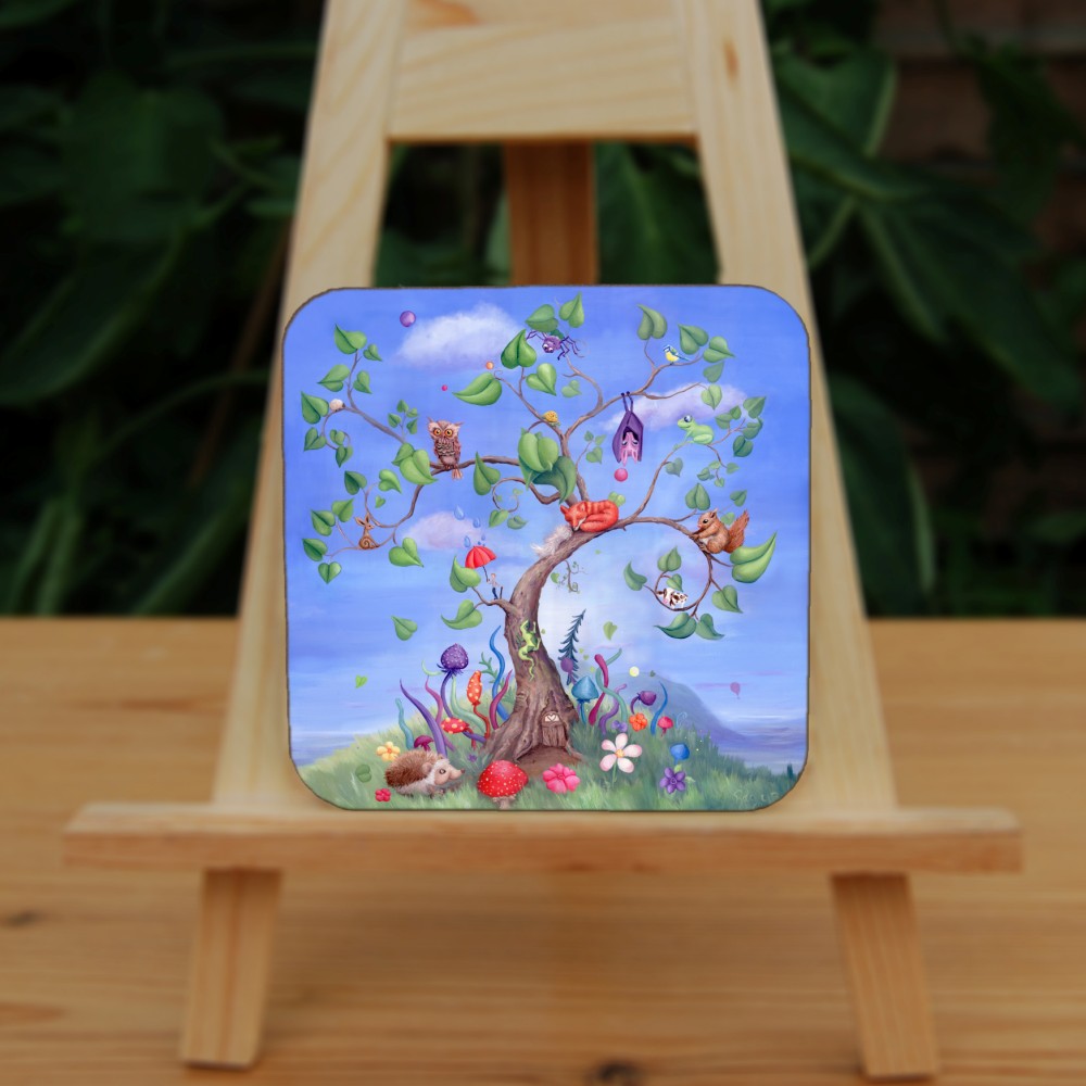 A tree with a curved trunk, curly branches and large green leaves, rises against a blue sky. Sitting on the branches are number of animals, including a fox, bat, spider, squirrel and owl. Also a tiny person holding an umbrella, and a very small cow! A fairy door can be seen at the foot of the tree, along with a hedgehog and colourful flowers and toadstools.