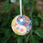 A close-up of the other side, just showing the central circle of the design without the outer details.