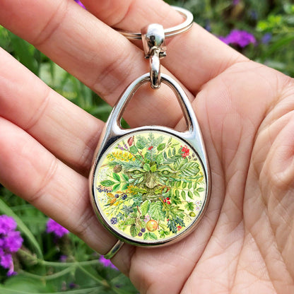 The leaves, berries and fruits of UK native trees sprout from a central green face.