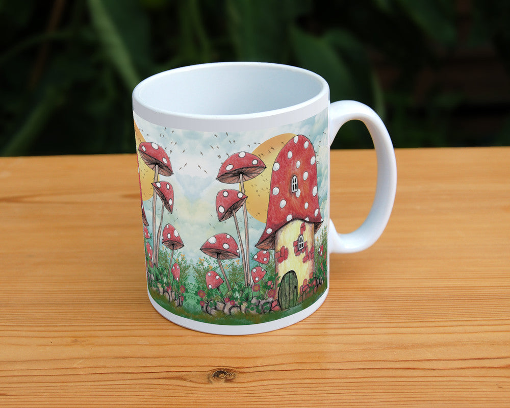 A cream toadstool house with red and white spotted roof, white curved windows, and an oval green door at the bottom. A low stone wall, entwined with leaves and red flowers, extends to each side, behind which is a mass of tall plants, several tall red toadstools on thin stems. An orange sun rises behind the house against a pale cloudy sky, and a flock of birds flies by.