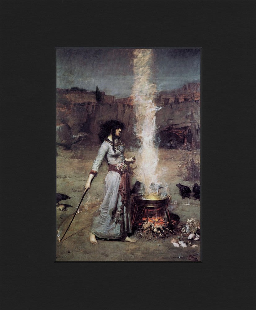 A woman walks barefoot around a metal firepit with a fire burning brightly underneath. She holds a sickle-shaped tool in the hand nearest the fire, and a long black pole, pointing outwards and touching the ground, in the other. The stick is creating a low burning circle of fire as she walks around the fire. The woman has long black hair and is wearing a long blue-grey dress. Ravens sit on the outside of the circle, and caves and rocks can be seen in the background. 